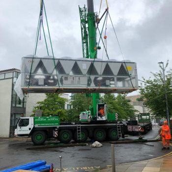 Crane lifting air con unit